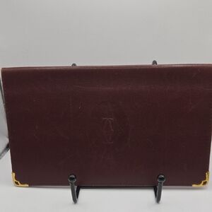 Cartier Burgundy Leather Wallet with Gold Accents